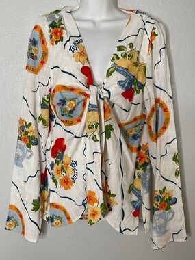 Sabo Alessia top featuring a white Trattoria print and a front tie closure